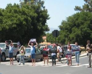Protesting Blocking the Campus and Palm intersection